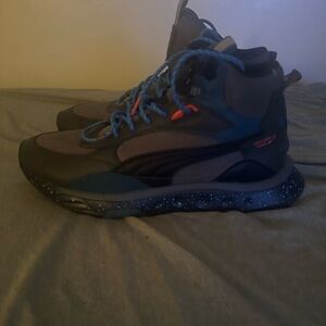 Pumas trainers (size 12). You can use this shoe for literally everything.